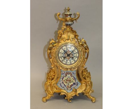 A GOOD 19TH CENTURY FRENCH ORMOLU AND CHAMPLEVE ENAMEL MANTLE CLOCK with eight day movement and champlevé enamel panels and u