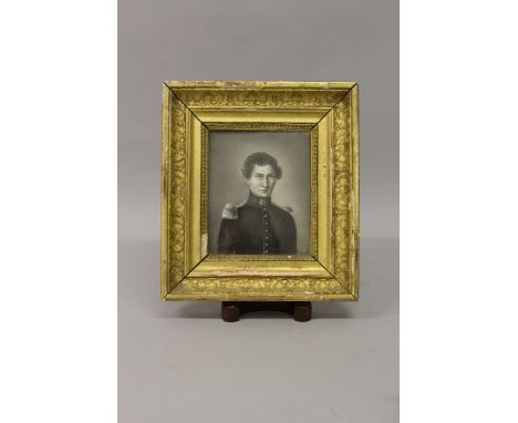 A PORTRAIT OF A YOUNG OFFICER, half length, Possibly French, in a gilt frame Signed 6ins x 4.5ins.