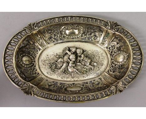 A 19TH CENTURY DUTCH SILVER OVAL .800 BASKET, the centre repousse with cupids playing musical instruments 12ins wide.