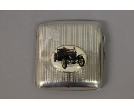 A VICTORIAN ENGINE TURNED CIGARETTE CASE, an oval of a vintage car Birmingham 1899.