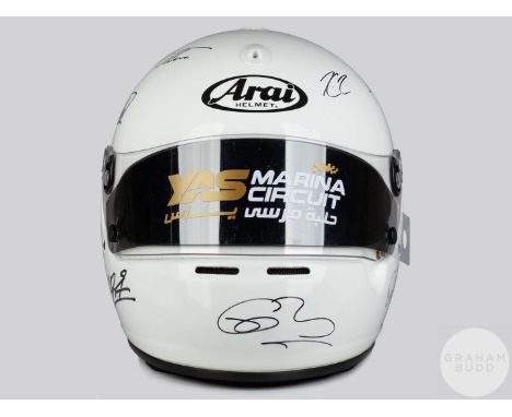 White Arai GP-5/k Yas Marina Abu Dhabi commemorative signed helmet, the helmet signed by eight F1 World Champions from 2000-2