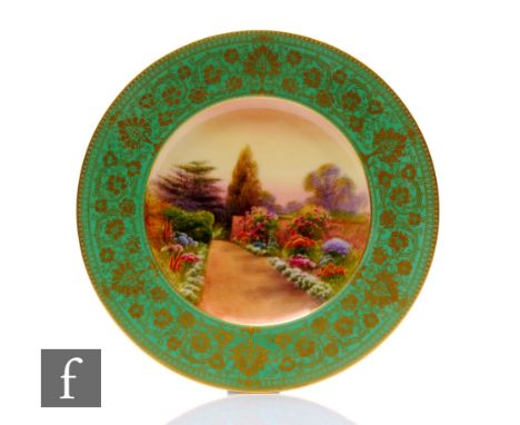 A Royal Worcester cabinet plate by Raymond Rushton, circa 1926, of circular form, titled Claremont Looking South, decorated w