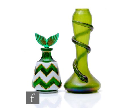 A Bohemian glass flask, green cased in opal and cut in a chevron design and highlighted in gilt, with a fish tail stopper, he