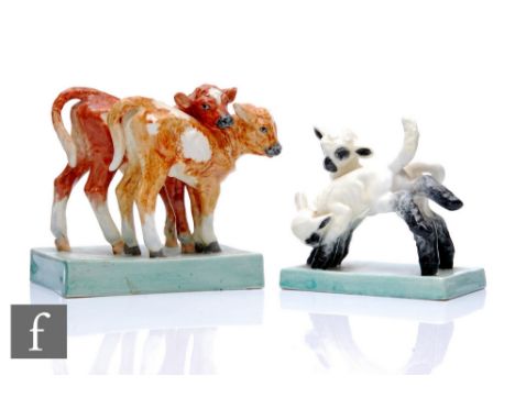 A Royal Worcester animal group modelled by Doris Lindner, circa 1938, titled 'Calves', tonal brown glazed, on celadon glazed 