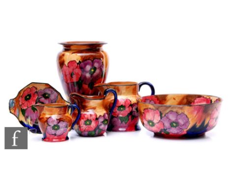 A collection of Hollinshead &amp; Kirkham, H &amp; K Tunstall Art Deco hand painted poppy pattern earthenware, to include a v