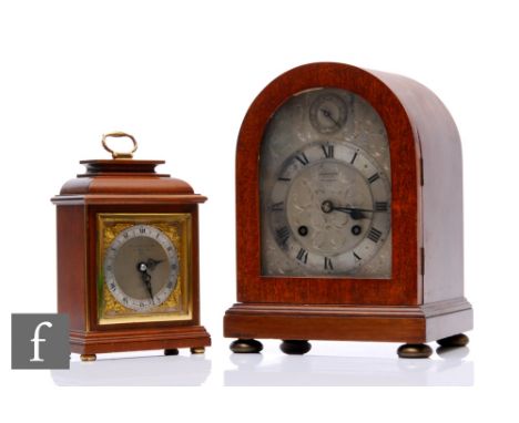 An Edwardian domed cased mahogany mantle clock, the engraved dial incorporating a slow/fast dial by R.C Marsh &amp; Co Limite