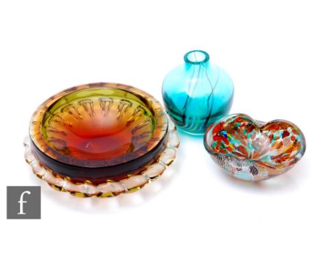 A Murano glass Tutti Frutti dish, of oval form with folded rim, random inclusions and silver flake over clear glass, width 14