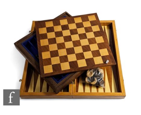 A 20th Century wooden backgammon set and a similar chess set. (2)