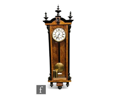 A late 19th Century part ebonised walnut regulator wall clock, eight day double weight driven movement, enclosed by a glazed 