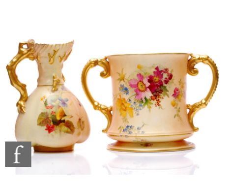 A Royal Worcester blush ivory loving cup, circa 1915, of flared cylindrical form with gilded C scroll handles, painted inside