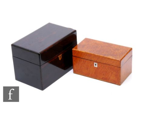 A 19th Century coromandle tea caddy fitted with a pair of satinwood domed top compartments, width 25cm, and a similar burr re