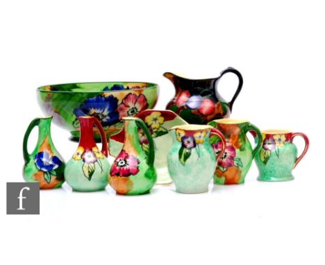 A collection of Hollinshead &amp; Kirkham, H &amp; K Tunstall Art Deco hand painted Poppy pattern earthenware designed by R G