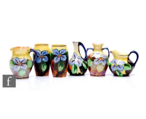 A collection of Hollinshead &amp; Kirkham, H &amp; K Tunstall Art Deco hand painted floral earthenware designed by R Grocott,
