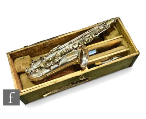 A Stasser Marigaux Tenor Saxophone No 13558, nickel plated circa 1937, height 73cm, in associated wooden crate.