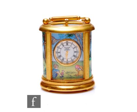 A Halcyon Days Winnie the Pooh gilt metal and brass cased carriage clock of compressed cylinder form, decorated to four panel