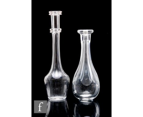 Two 19th Century clear crystal toddy lifters,&nbsp;the first circa 1820, with slice cut slender body and applied medial knop,