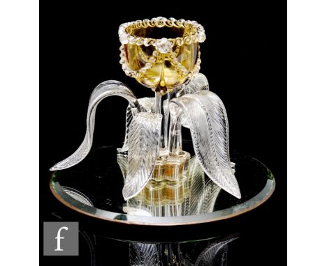 A Victorian glass epergne, comprising central flower holder of ovoid form with applied clear crystal rigger work over a citro