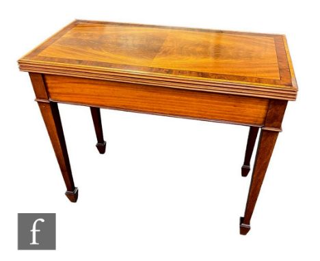 A late Victorian mahogany and satinwood crossbanded card table, the rectangular quartered veneered top over a plain frieze on