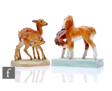 A Royal Worcester figure modelled by Doris Lindner, circa 1935, titled 'Foals', in tonal brown glaze on celadon glazed slab b