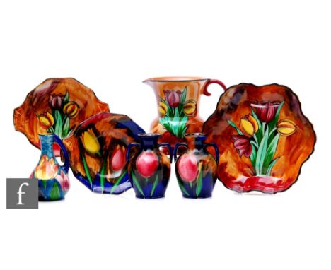 A collection of Hollinshead &amp; Kirkham, H &amp; K Tunstall Art Deco hand painted Tuliptime pattern earthenware, designed b