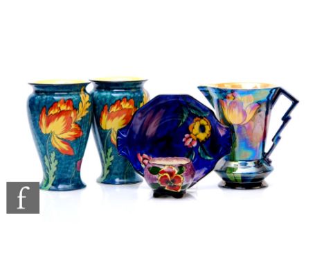 A pair of Hollinshead &amp; Kirkham. H &amp; K Tunstall Art Deco hand painted Lonsdale pattern vases of inverse baluster form