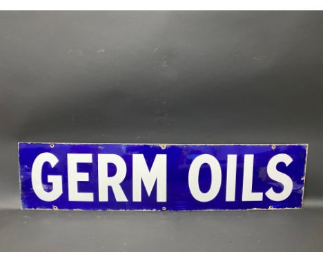 A Germ Oils rectangular enamel sign with good gloss, 42 x 10".