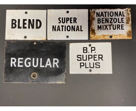 Five small enamel petrol pump brand indicator signs including BP Super Plus.
