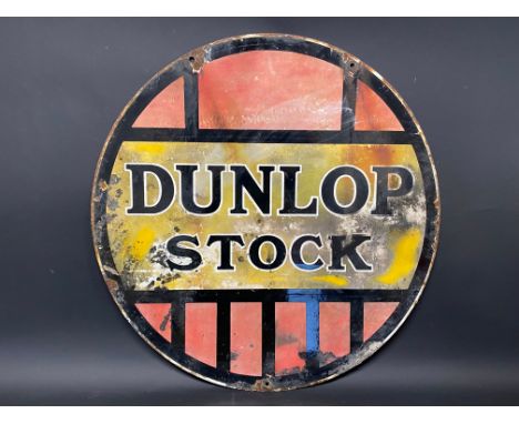 A Dunlop Stock circular double sided enamel sign, 24" diameter.