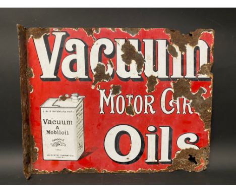 A Vacuum Motor Car Oils part pictorial double sided enamel sign with hanging flange and image of a can on both sides, 20 x 16