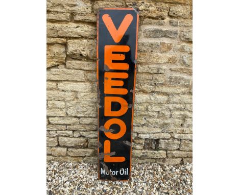A Veedol Motor Oil narrow enamel sign, 11 1/2 x 55".