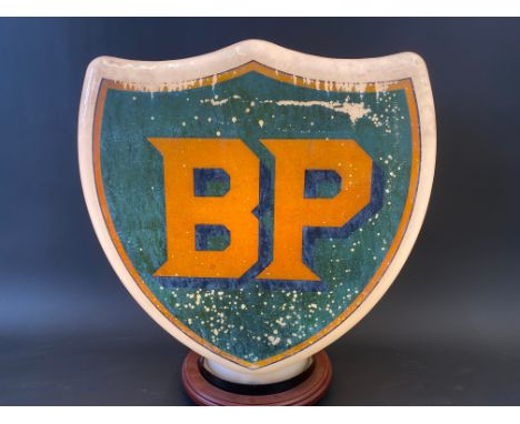 A BP shield shaped glass petrol pump globe by Hailware, fully stamped underneath.