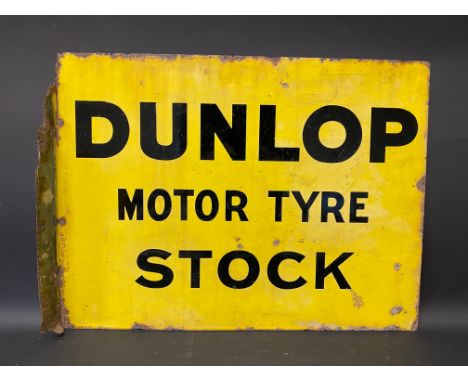 An early Dunlop Motor Tyre Stock rectangular double sided enamel sign by Patent Enamel, with hanging flange, 24 x 18".