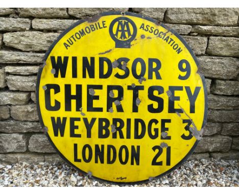 An AA circular yellow and black enamel road/village sign for Chertsey, made by Jordan of Bilston, 36" diameter.