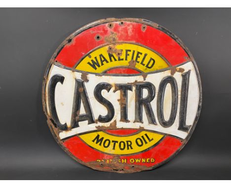 A Continental Wakefield Castrol embossed steel enamel sign, 24" diameter.