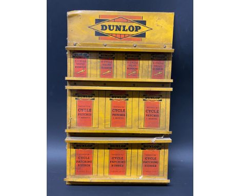 A Dunlop counter top tin 'Reddifix' Cycle Patch dispensing sign, 7 1/2" w x 12 1/2" h.