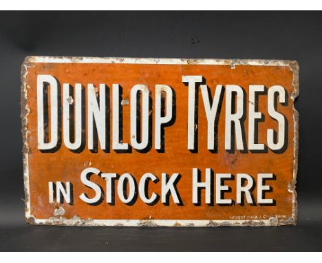 An early Dunlop Tyres in Stock Here rectangular double sided enamel sign lacking hanging flange, by Robert Park &amp; Co. Lon