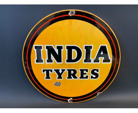 An India Tyres circular enamel sign, 18" diameter.