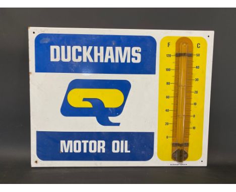 A Duckhams Motor Oil enamel thermometer by Burnham, in good condition, 26 x 20".
