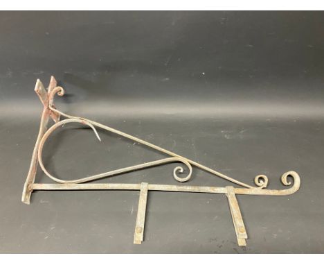 A metal enamel sign hanging bracket.