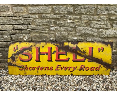 A Shell Shortens Every Road rectangular enamel sign, 54 x 18".