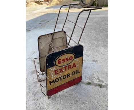 An Esso Extra garage forecourt oil bottle trolley, with an aluminium advertising sign to each side.