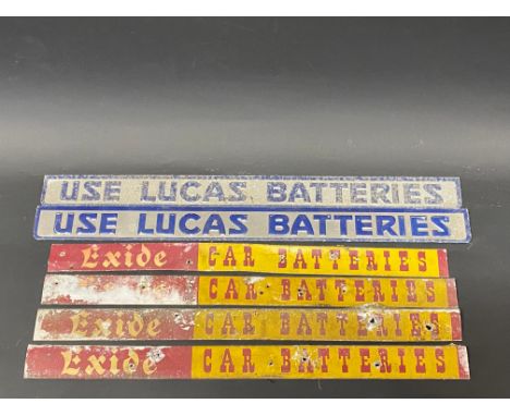 Two Lucas Batteries embossed shelf strips plus four Exide Batteries shelf strips.