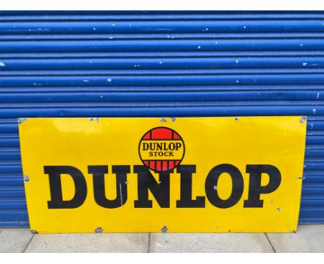 A Dunlop Stock rectangular enamel sign with good gloss, by Jordan of Bilston, 54 x 24".