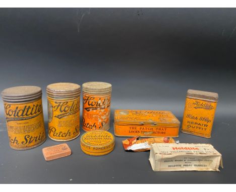 A small collection of Holdtite repair outfit tins and patch strip tins etc.