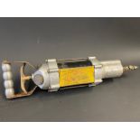 A Vigzol Topoyl upper cylinder lubricant dispensing gun.