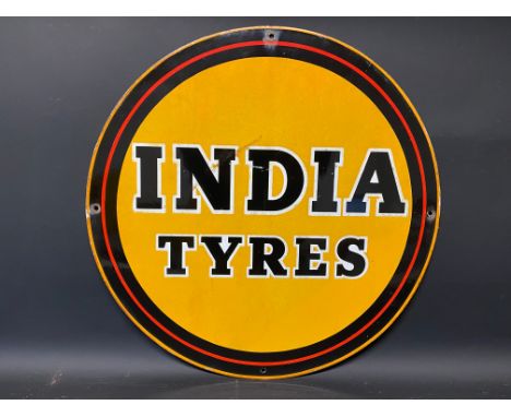 An India Tyres circular enamel sign, 18" diameter.