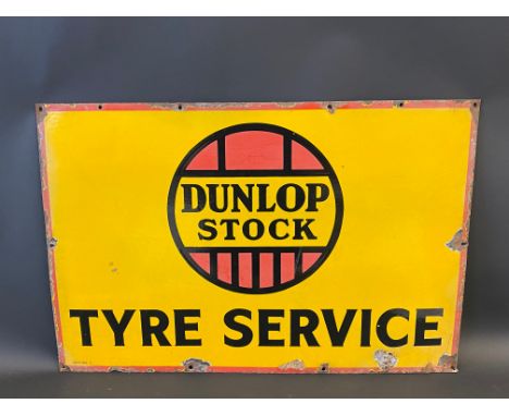 A Dunlop Stock Tyre Service rectangular enamel sign, 30 x 20".