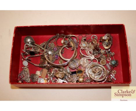 A tray box and contents of various silver and white metal jewellery 