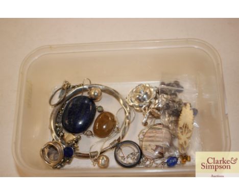 A tray box and contents of various white metal jewellery to include a bangle, bracelets etc.