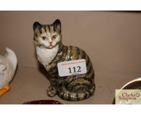 A Beswick No.1031 seated silver tabby cat